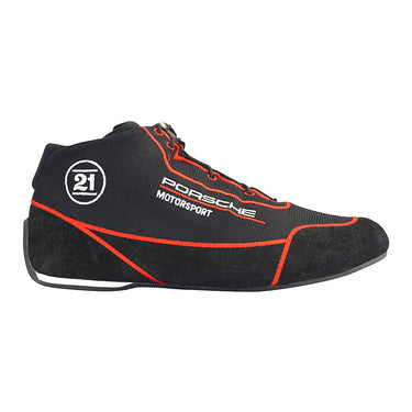 Black Porsche Motorsport shoe with red accents on a white background